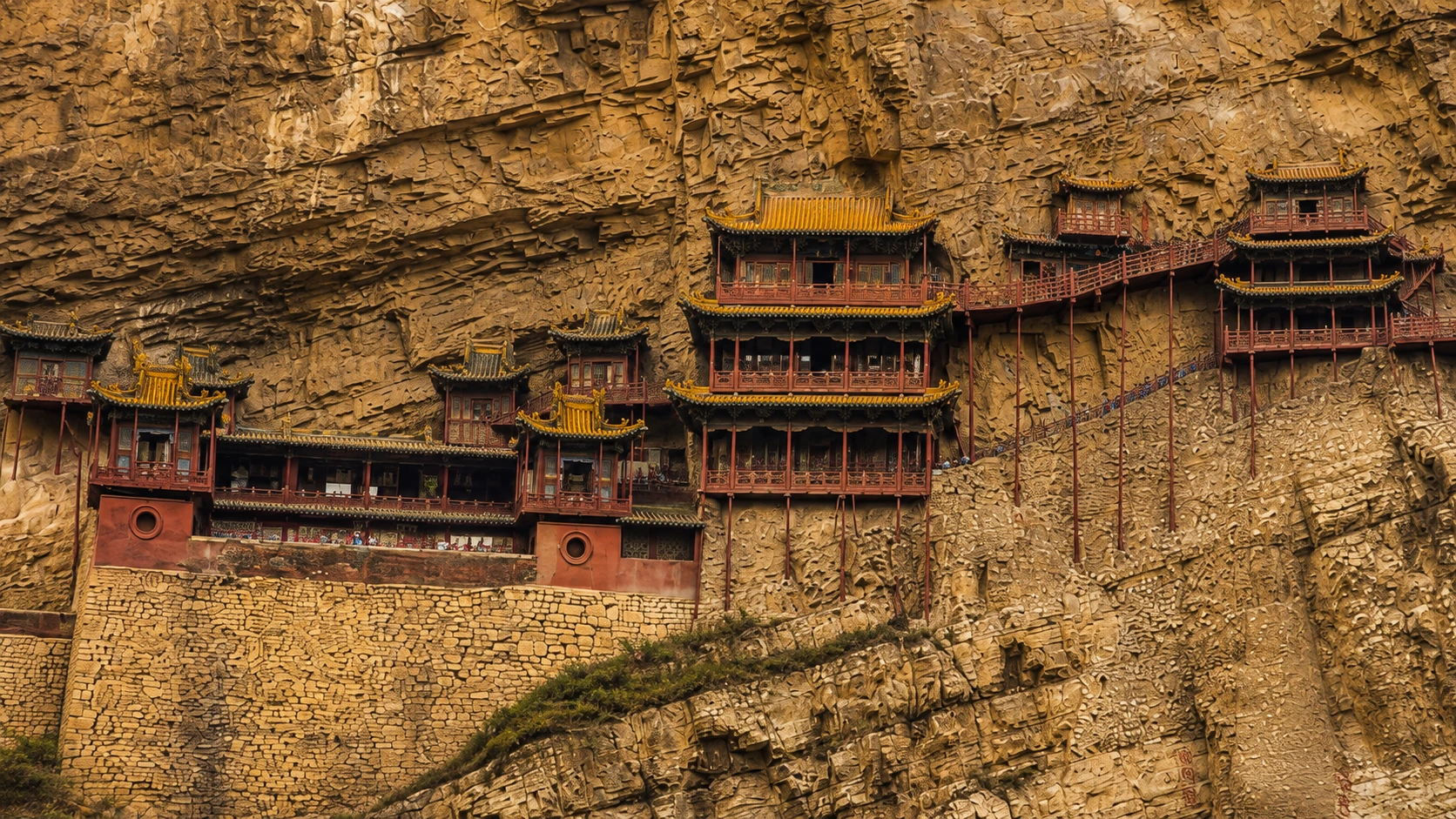 The Hanging Temple built onto a vertical cliff face near Datong, seen from the valley floor